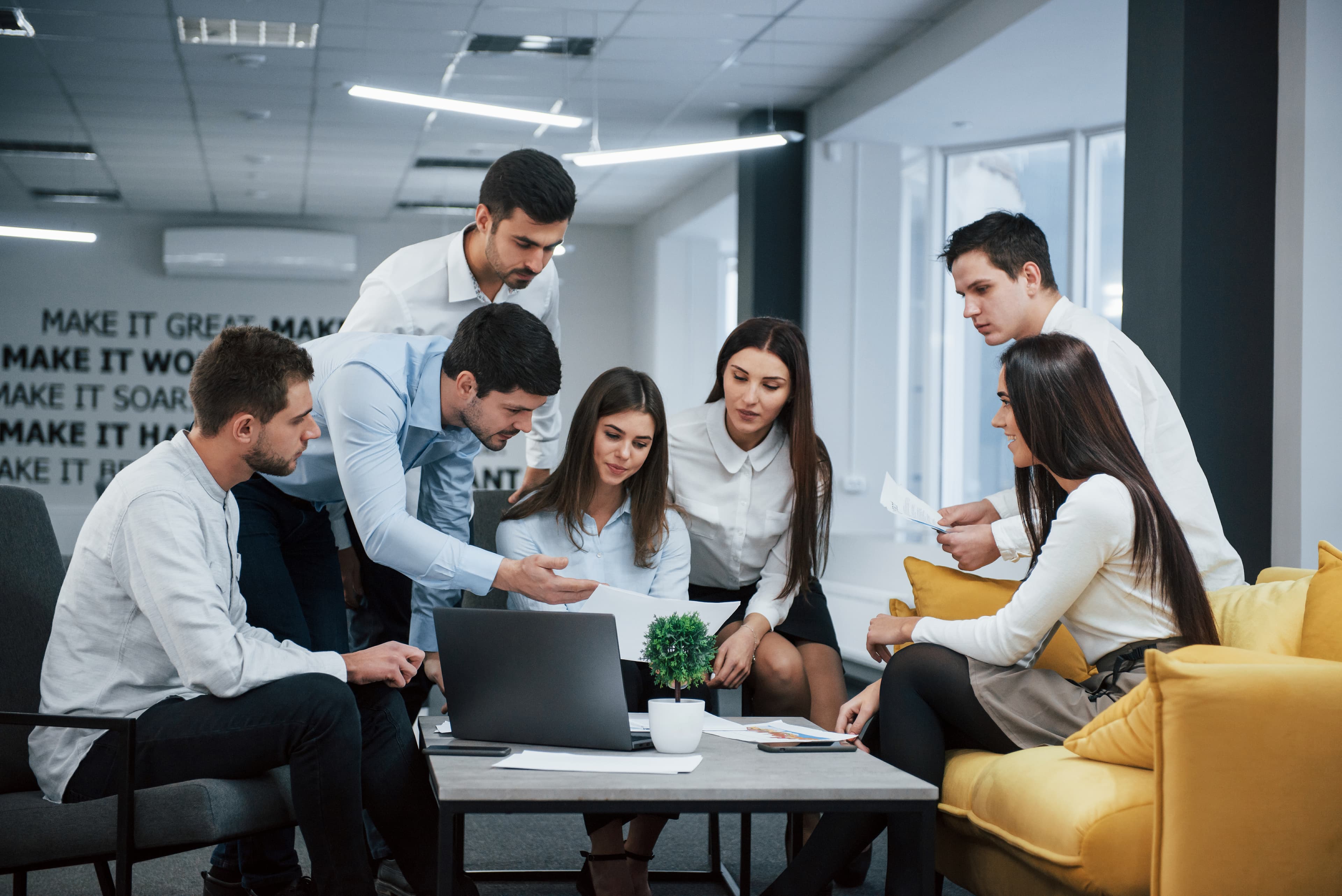 San Marina team collaborating at office